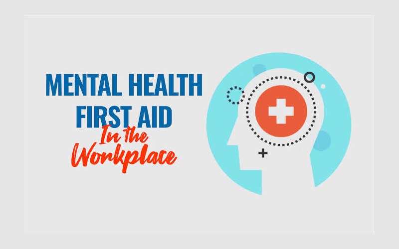 Trainer leading a Workplace Mental Health First Aid session in a company meeting room